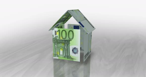 Euro 100 EUR money banknotes paper house on the table