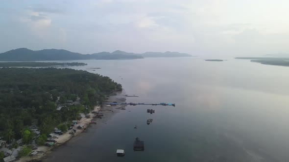 Aerial view fly near port of Phra Thong island in area of Andaman with morning light