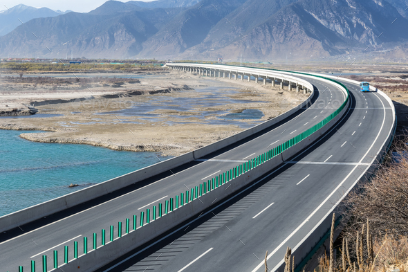 road and bridge on rivers at the Tibetan Plateau - Stock Photo - Images