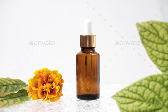 face care oil or serum in amber glass bottle with pipette. autumn decor, fall sale,