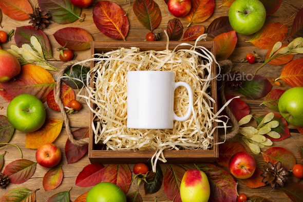 White coffee mug mockup with fall leave and pine cones - Stock Photo - Images