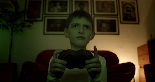 Boy Using Games Console