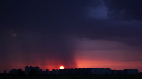 Sunset Rain Over the City