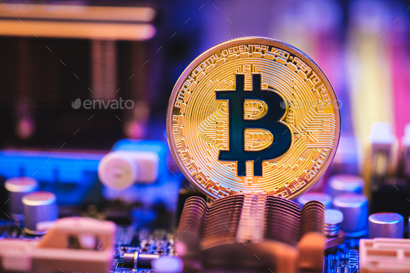 Bitcoin crypto currency on circuit board .virtual money.blockchain technology.mining concept - Stock Photo - Images