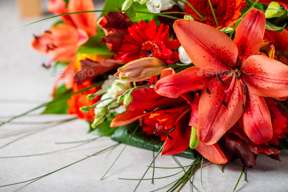 Vibrant Bouquet of orange Asiatic lilies and other flowers