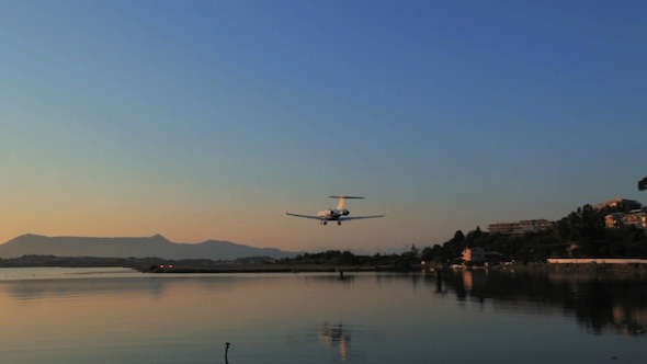 Two Airplanes Landing, Sunset Scenes in Airport