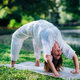 Yoga Woman Doing Bridge Pose, Natural Green Background - PhotoDune Item for Sale