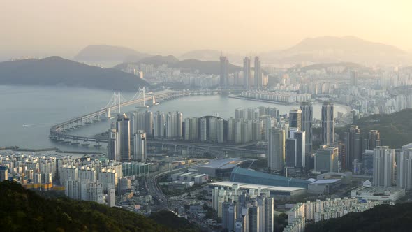 Busan, South Korea. Panning View of City Center in Morning Lights.  alt