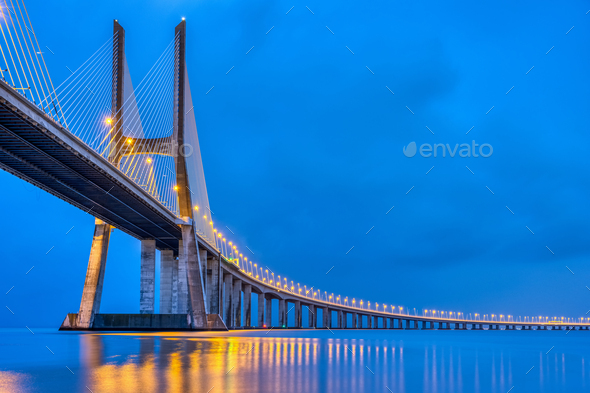 The Vasco da Gama bridge in Lisbon at dusk - Stock Photo - Images