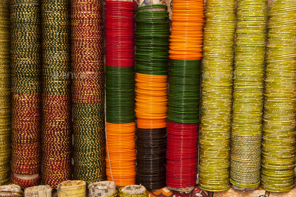 Background of colorful bangles stacked in a shop in India