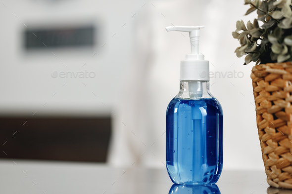 Antibacterial hand sanitizer gel on hotel front desk