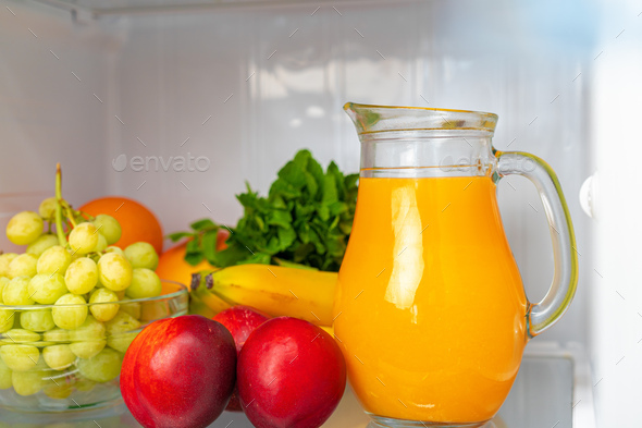 Glass Pitcher With Orange Juice And Fresh Orange Stock Photo, Picture and  Royalty Free Image. Image 64457206.