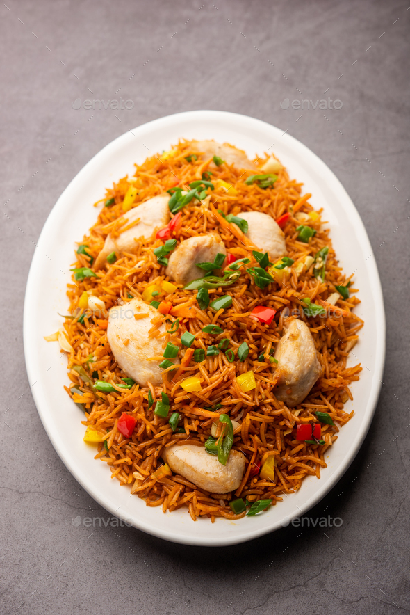 schezwan chicken fried rice Stock Photo by stockimagefactory | PhotoDune