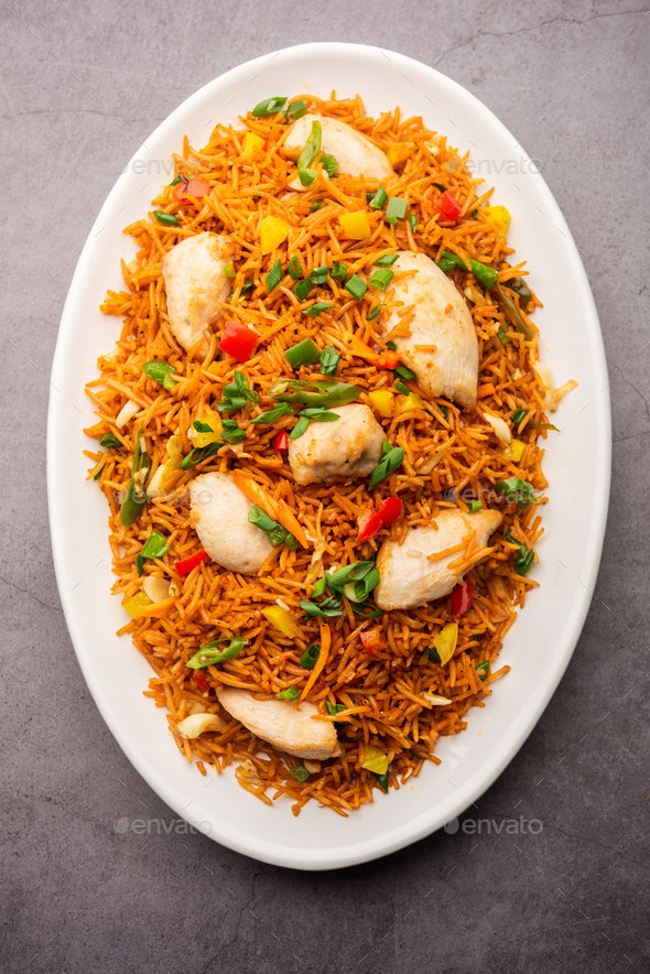 schezwan chicken fried rice Stock Photo by stockimagefactory | PhotoDune