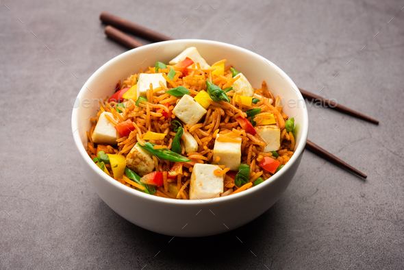 Schezwan or Szechuan paneer fried rice with Stock Photo by ...