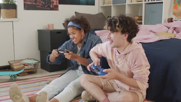 Two Friends Playing on Console alt