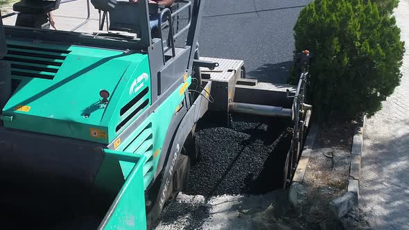 Road Construction Applying New Hot Asphalt