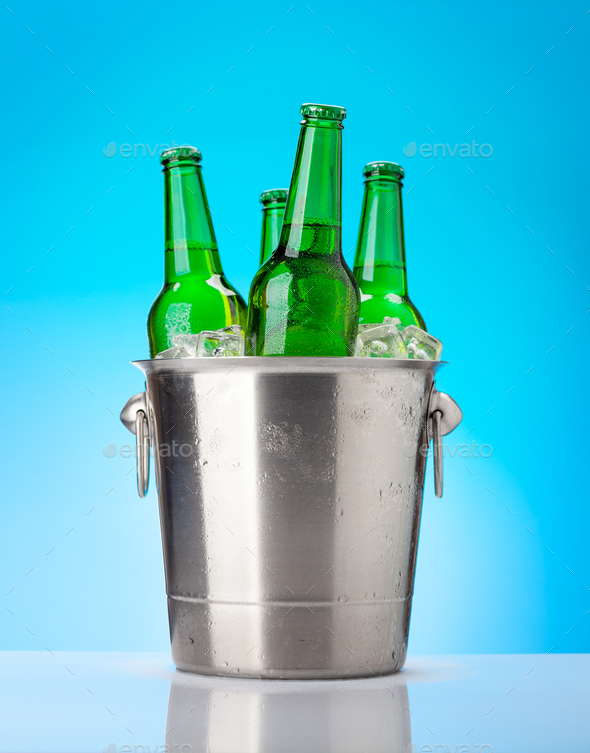 Beer bottles in ice bucket Stock Photo by karandaev PhotoDune