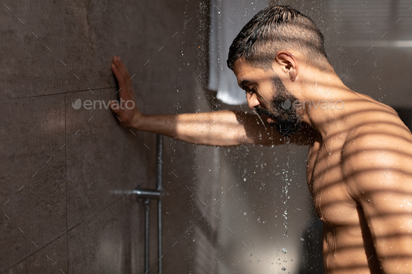 Young man taking shower in bathroom guy washing Vector Image