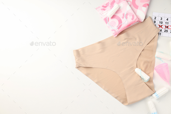 Concept of menstruation period on white background - Stock Photo - Images