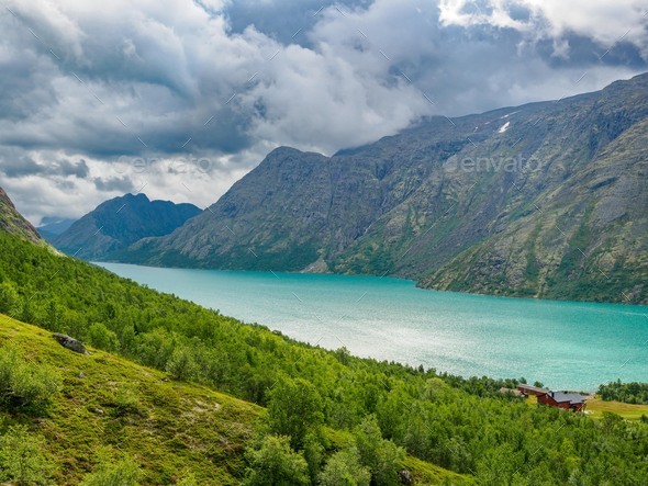 View of turquoise lake gjende from the famous Besseggen hiking trail, Norway - Stock Photo - Images
