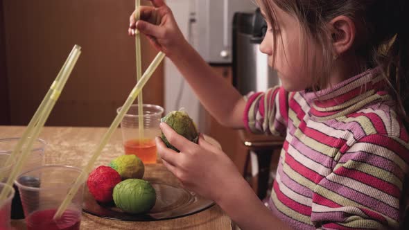 Children Paint Easter Eggs with Colorful Dyes in an Unusual Way alt