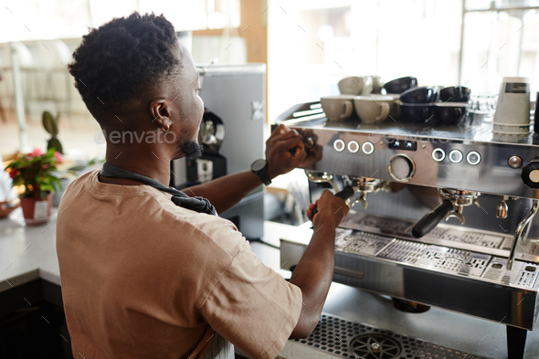 Preparing Coffee Machine For Workday - Stock Photo - Images