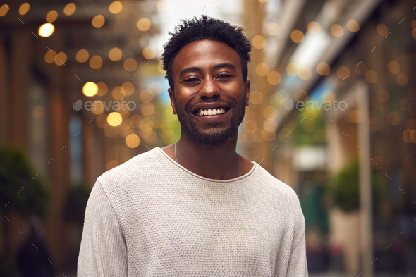 Portrait Of Young Man Enjoying City Life Heading For Night Out - Stock Photo - Images