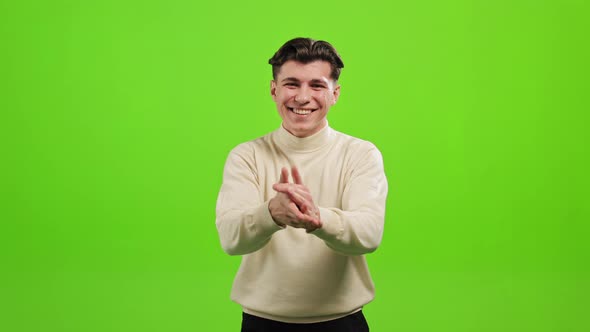 The Man is Standing and Looking at the Camera alt