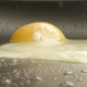 Cooking Egg On A Frying Pan A Macro Shot On Red Camera - VideoHive Item for Sale