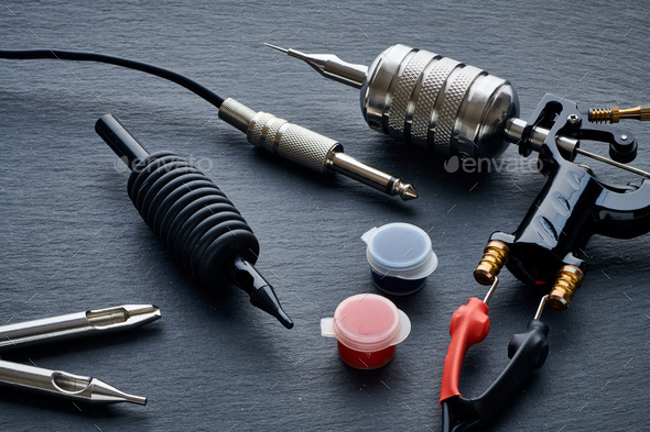 Tattoo machine, tools and supplies - Stock Photo - Images