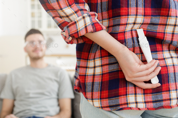 Young husband ready to learn pregnancy test results waiting to be father