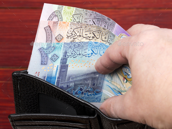 Kuwaiti money in the black wallet - Stock Photo - Images