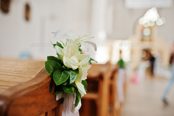 Flowers of decor at wedding church ceremony.