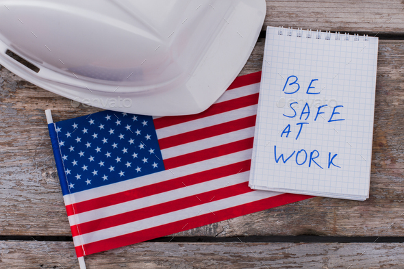Flat lay warning american builders workers to be safe at work.