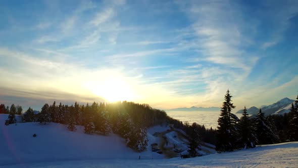 Intensive Sunset Over Valley and Ski Resort