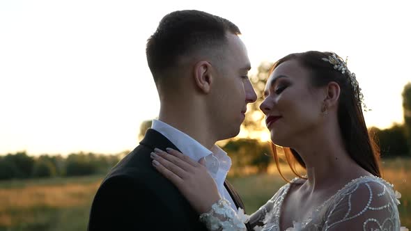 Wedding Day Newlyweds Walk Together Holding Hands alt