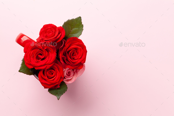 Rose flowers in coffee cup Stock Photo by karandaev | PhotoDune