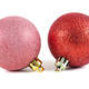 Red and pink christmas baubles on white background - PhotoDune Item for Sale