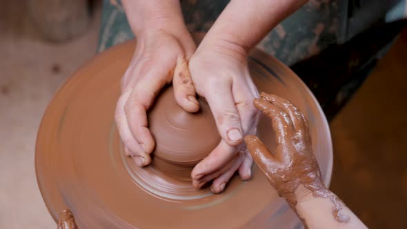 Close Up Hands Pottery Wheel Pot Clay Potter Child Craft Art Education alt