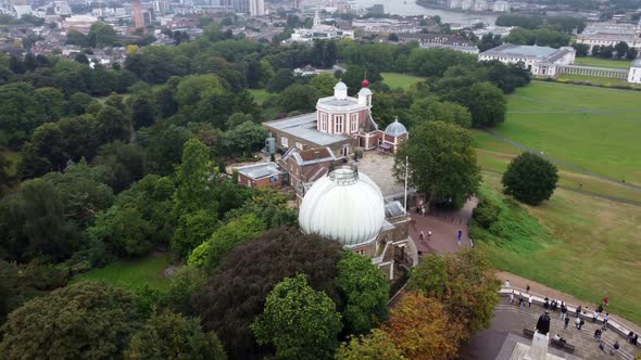 Shooting From a Drone of an Observatory Surrounded By Lush Trees