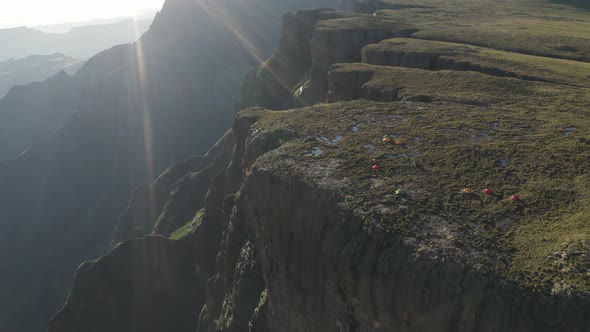 Aerial View of people camp at the Torceira Pico waterfalls on the mountain. alt