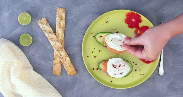 Avocado smoked salmon fried eggs breakfast