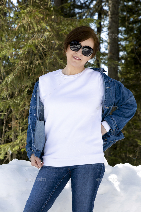 Placeit – Sweatshirt mockup of a woman in sunglasses, winter - Stock Photo - Images