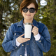 Placeit – In the winter forest, a woman in sunglasses with a travel mug layout, model layout - PhotoDune Item for Sale
