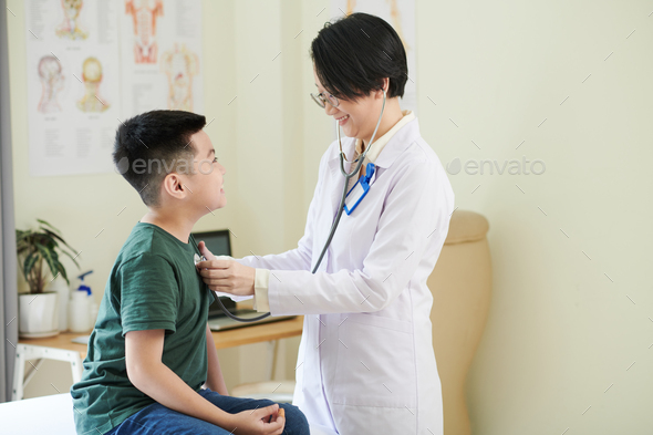 Pediatrician Listening to Heartbeat of Boy