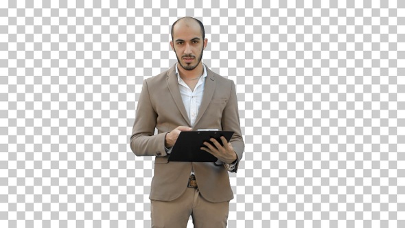 Businessman holding clipboard and presenting, Alpha Channel