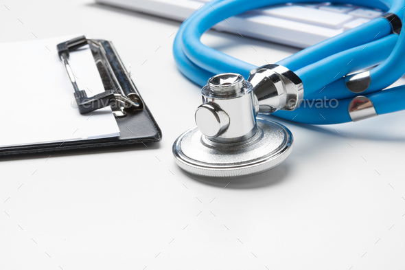 Blank medical clipboard with stethoscope on white background Stock ...