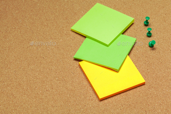 Cork board with several colorful blank notes with pins Stock Photo by  FabrikaPhoto