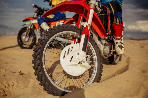 Motocross rider on extreme desert terrain track - Stock Photo - Images